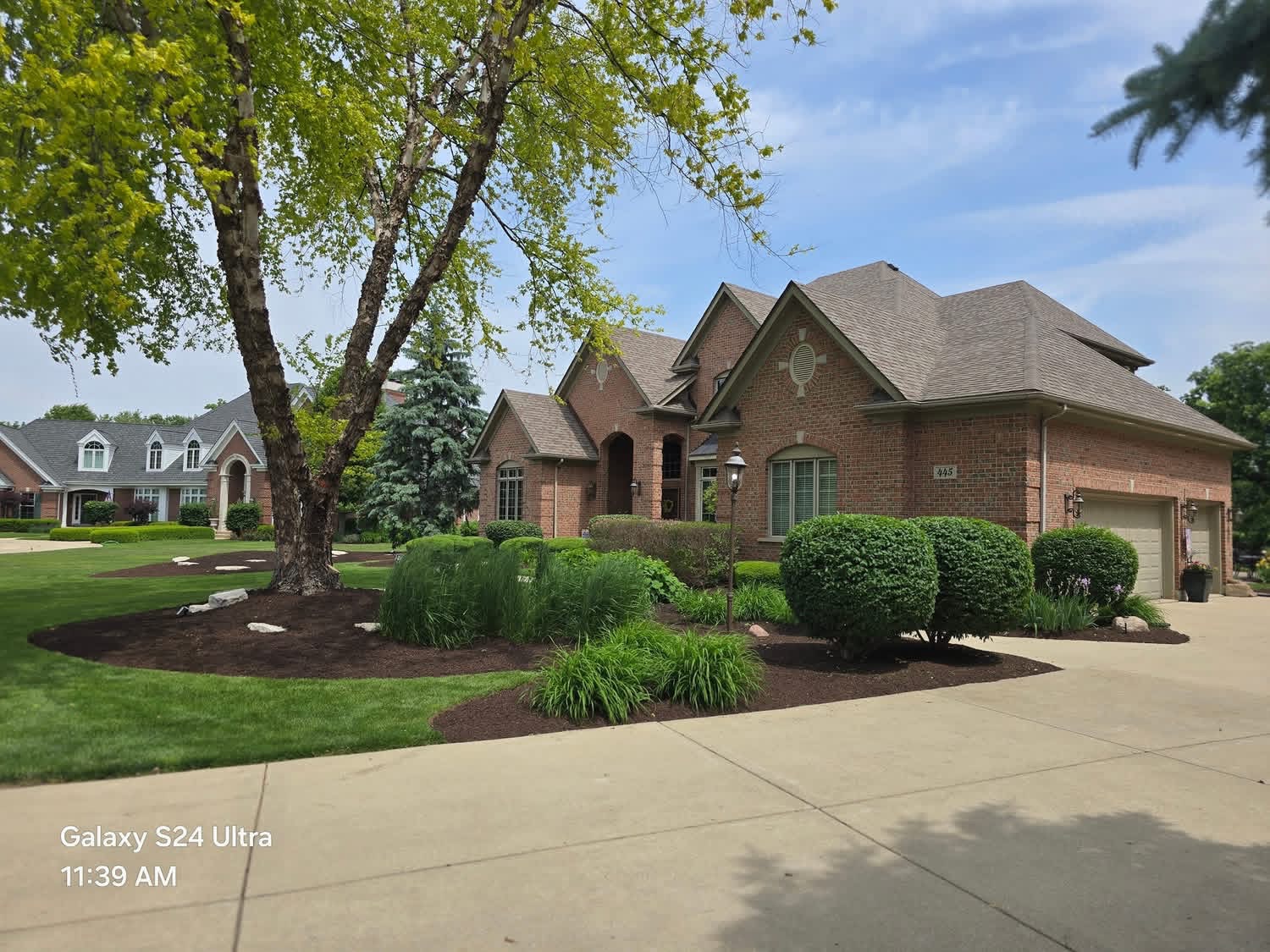 Crisp lawn and manicured foundation plantings